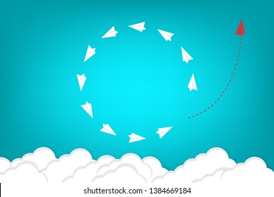 Red airplane changing direction and white ones. New idea, change, trend, courage, creative solution, innovation and unique way concept.