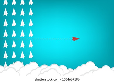 Red airplane changing direction and white ones. New idea, change, trend, courage, creative solution, innovation and unique way concept.