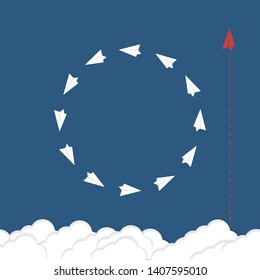 Red airplane changing direction and white ones. New idea, change, trend, courage, creative solution, innovation and unique way concept.