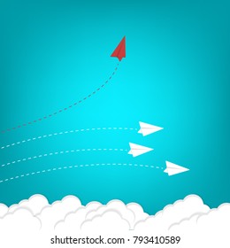 Red airplane changing direction and white ones. New idea, change, trend, courage, creative solution, innovation and unique way concept.