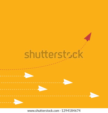 Red airplane changing direction and white ones. New idea, change, trend, courage, creative solution, innovation and unique way concept.