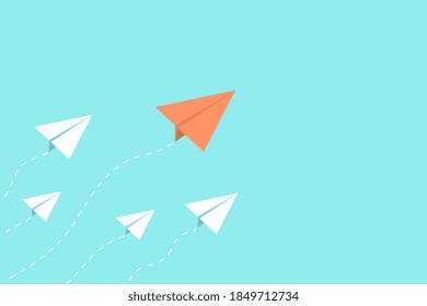 The red airplane is in the lead, while the white one follows it.