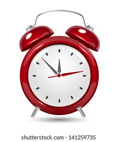 Red alarm clock close up on white