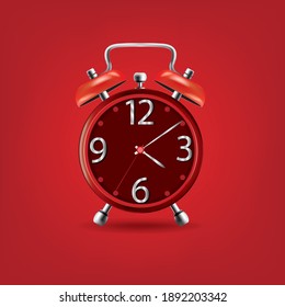 
roter Wecker auf rotem Hintergrund