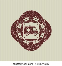 Red ambulance icon inside distress rubber grunge stamp