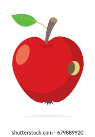 red apple with hole made by worm