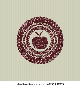 Red apple icon inside distress rubber grunge texture stamp