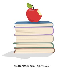 Red apple on a stack of books