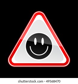 Red attention warning sign with smiley face symbol on black