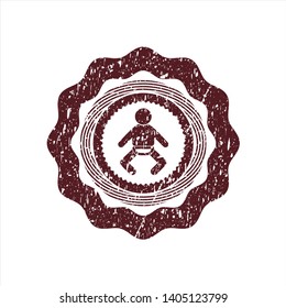 Red baby icon inside rubber texture