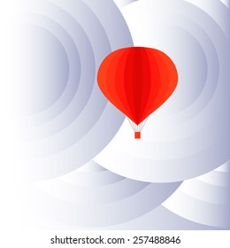 red balloon among spherical clouds