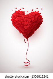 Red balloon in form of heart on made of small hearts.