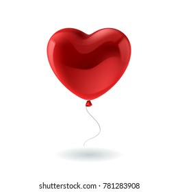 Red balloon in form of heart on light background.