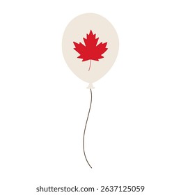 A red balloon with a leaf on it. The balloon is floating in the air