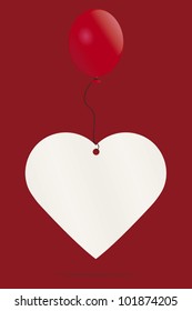 Red balloon lifting a heart shaped message card with space for text.