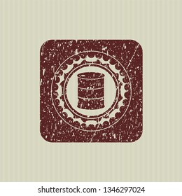 Red barrel icon inside distressed grunge stamp
