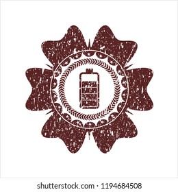 Red battery icon inside distress rubber grunge texture stamp