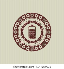Red battery icon inside distress rubber grunge texture seal