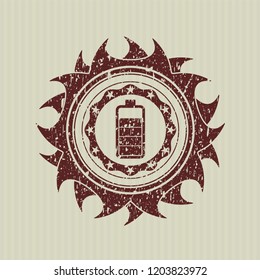 Red battery icon inside grunge seal