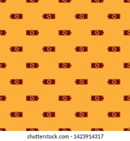 Red Battery icon isolated seamless pattern on brown background. Lightning bolt symbol. Vector Illustration
