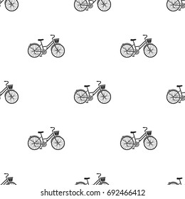 A red bicycle with wheels and basket. The eco-friendly transport.Different Bicycle single icon in black style vector symbol stock illustration.