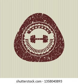 Red big dumbbell icon inside rubber texture