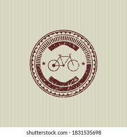 Red bike icon inside rubber grunge texture stamp. 