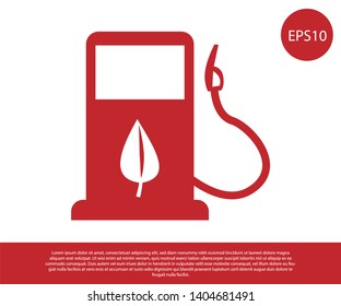 Red Bio fuel concept with fueling nozzle and leaf icon isolated on white background. Gas station with leaves. Eco refueling. Vector Illustration