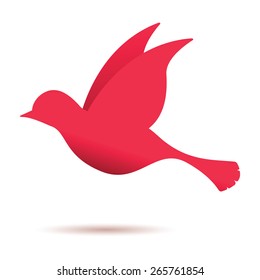 red bird in flight