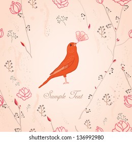 red bird with a flower