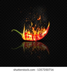 Red bitter pepper is embraced by fire on a black background and reflected in the glossy surface of the table.