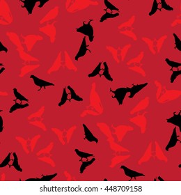 Red and black birds on a red background