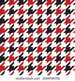 Red, black and white dogstooth pattern. Seamless vector houndstooth design suitable for fashion, home decor and stationary.
