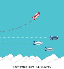 Red blimp changing direction and white ones. New idea, change, trend, courage, creative solution, innovation and unique way concept.