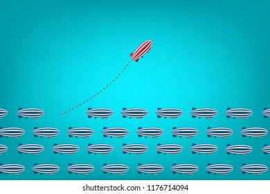 Red blimp changing direction and white ones. New idea, change, trend, courage, creative solution, innovation and unique way concept.