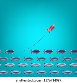 Red blimp changing direction and white ones. New idea, change, trend, courage, creative solution, innovation and unique way concept.
