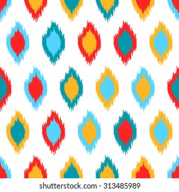 Red blue yellow and white colorful ikat asian traditional fabric seamless pattern, vector