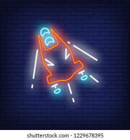 Red bobsleigh neon sign. Glowing bob with sport team on dark blue brick background. Can be used for sport, winter games, Olympic
