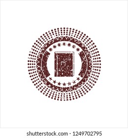 Red book icon inside distressed grunge stamp