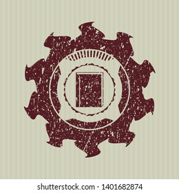 Red book icon inside distressed rubber texture