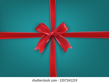 Red Bow Gift on turquoise background. Gift background