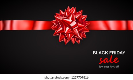 Red bow with horizontal ribbon with shadow and inscription Black Friday Sale on black background