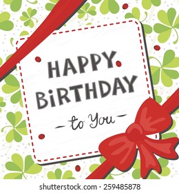 red bow on clover meadow with ladybugs background gift wrap paper with birthday card