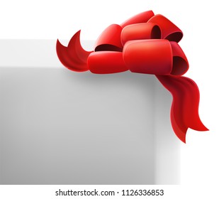 Red Bow on a White Box. Isolated Object