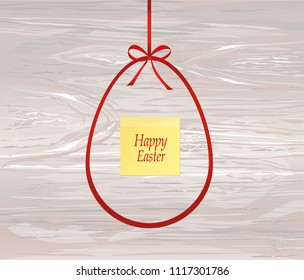 Red bow in the shape of the Easter egg. Greeting card or invitation for a holiday.  Yellow sheet of paper for notes. Sticker.  Empty place for text or advertising. Vector on wooden background.