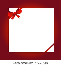 red bow and white paper