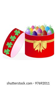 red box adorned with a ribbon in the Inside Easter eggs isolated on white background