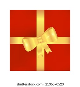 Caja roja con arco de regalo dorado.