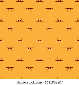 Red Bra icon isolated seamless pattern on brown background. Woman underwear.  Vector Illustration