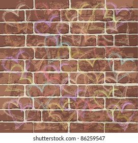 red brick wall with painted hearts as background